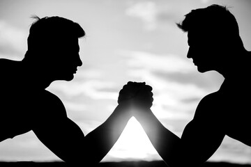 Poster - Two men arm wrestling. Rivalry, vs, challenge, strength comparison. Sunset, sunrise. Black and white