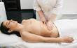 © Peakstock - Medical exam. Doctor doing preventive check-up of a female abdomen for examination of woman's internal organs