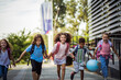 © liderina - Excited children run to school.