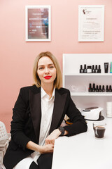 Beauty salon. Manicure cabinet. Staff. Master Manicurist at her workplace.