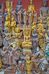 Wall Mural - The wooden sculptures in store of Shwe-gui-do quarter, Mandalay, Myanmar