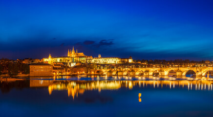 Wall Mural - View of Charles Bridge Karluv most and Prague Castle Prazsky hrad in twilight. Panorama