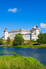 Sticker - Beautiful Lacko castle by the lake Vanern in Sweden in the summer