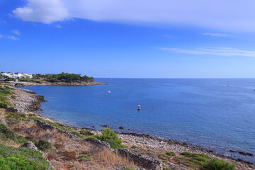 Wall Mural - Marina San Gregorio, with its unspoiled sea beds, the blue sea and the rocky coast, offers an wonderful view along the coastline of Patù in Salento, Apulia (Italy).