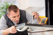 © auremar - expert panel fixing the kitchen oven in a new apartment