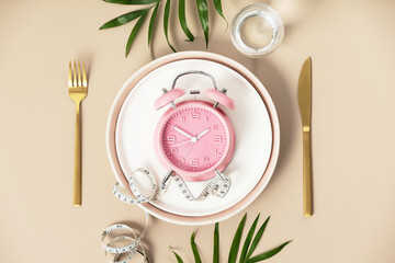 Wall Mural - Composition with cutlery, plate, measuring tape and alarm clock on color background. Diet concept