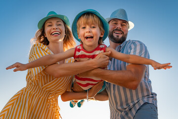 Canvas Print - Happy family having fun on summer vacation