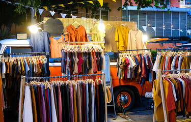 Wall Mural - An open-air clothing store. Sale of clothing in the old school style