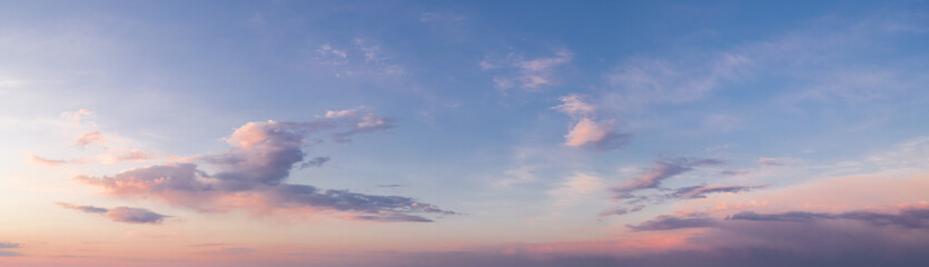 panorama of a bright dramatic twilight sky, beautiful clouds at dawn