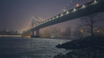 Fototapete - Manhattan bridge and east river at foggy night