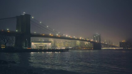 Fototapete - Brooklyn bridge and Manhattan at foggy night