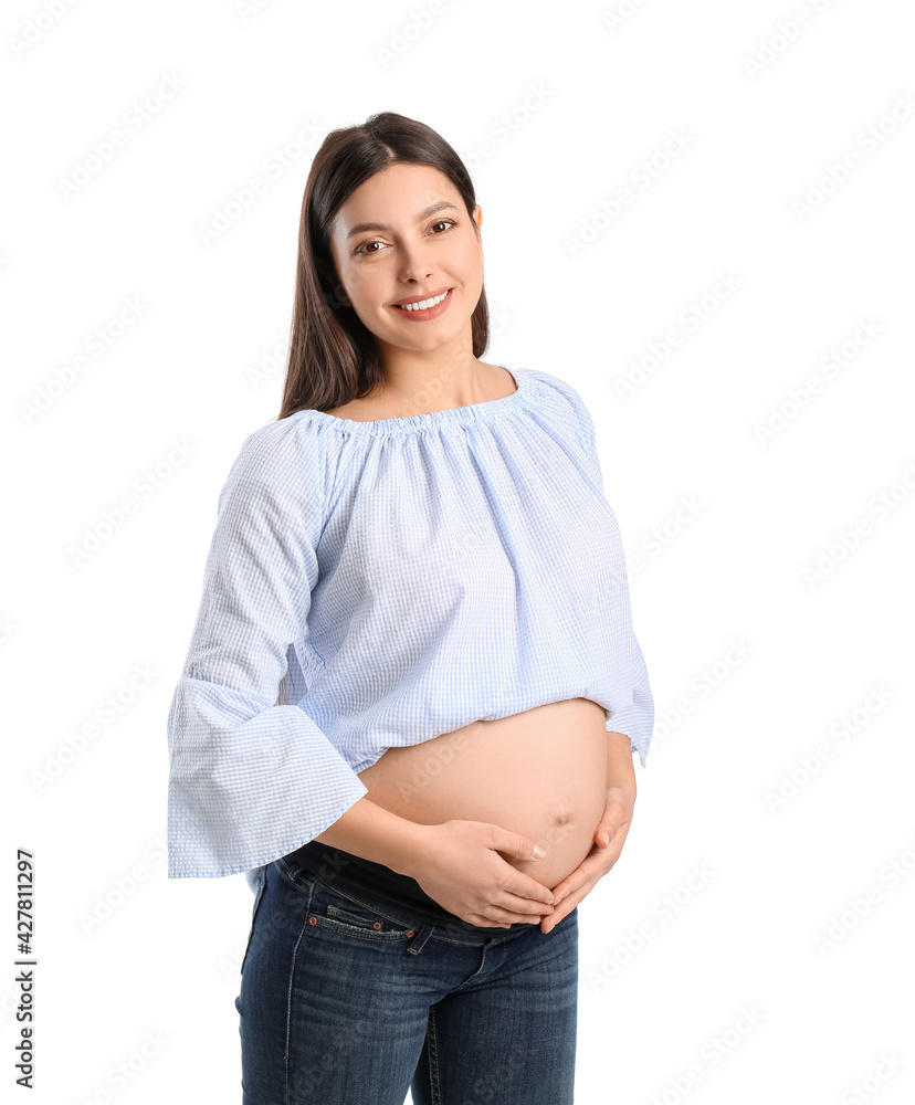 Young pregnant woman on white background