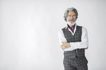 Handsome pensive mature businessman in formal suit