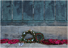 View Of White Roses Against War Memorial