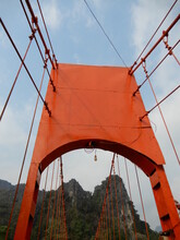 Cable Suspension Bridge Over The Nam Song River, Outside Vang Vieng, Laos.