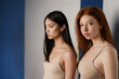 © Drobot Dean - Multiracial two women in underwear posing on camera