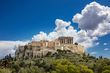 Wall Mural - Athens, Greece, Acropolis hill, blue cloudy sky background