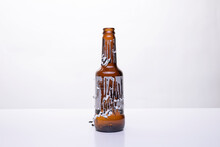 Beer Bottle With Scraped Label, Removing Sticky Paper Label From A Glass Beer Bottle, Properly Recycling Glass