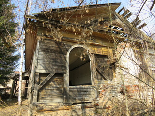 Wall Mural - An old abandoned building on a sunny day.