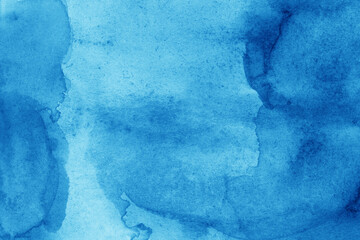 Hand painted blue watercolor background.