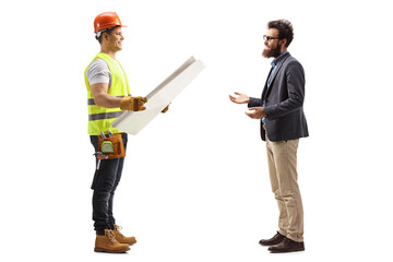 Wall Mural - Full length profile shot of a builder with a blueprint talking to a bearded man