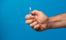 Man Hand With Lighter With Fire Flame