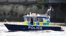 English Patrol Police Boat Patrolling On The River Thames. London
