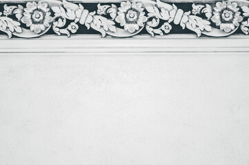 Closeup shot of plaster ornamental decoration on a white wall