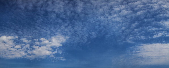 Wall Mural - Panoramic view of blue sky with white clouds