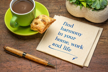 find harmony in your home, work and life - inspirational handwriting on a napkin with a cup of coffee, lifestyle and personal development concept