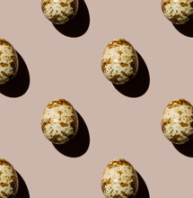 Quail Egg On Beige Background Pattern