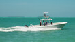 Fishing boat or yacht. Private cruise tour. Summer vacations on ocean or Gulf of Mexico Florida. Yachting sport. Turquoise ocean water. Beautiful seascape. 