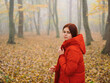 © SHOTPRIME STUDIO - Woman red jacket in the forest in autumn Yellow leaves walk outdoors