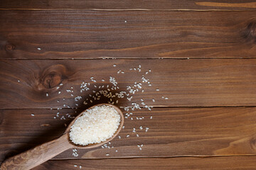 spoon with rice on a wooden table, background, texture, food, cooking, culinary recipes, wood wood texture