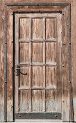 Wall Mural - Old wooden door as a background.