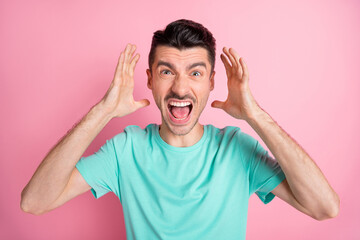 Canvas Print - Portrait of young angry stressed unhappy annoyed depressed man scream shout conflict isolated on pink color background