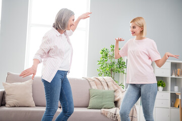 Sticker - Photo of happy funky cheerful family women dance good mood music lover in living room indoors house home