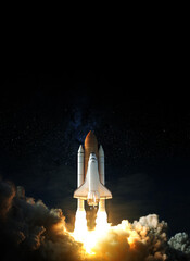 Wall Mural - space shuttle takes off into space. elements of this image furnished by nasa.