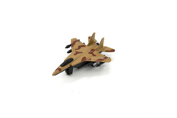 Plastic toy military jet plane on white background.