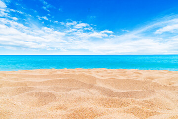 Summer Vacation and Travel Holiday Concept : Sand beach and blurred seascape view blue sky in background.