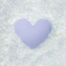 Delicate Heart Shaped, Soft Frame, Made Of Pastel White And Pale Green Fluffy Seed Hairs On Bright Violet Background. Minimal Valentines Or Mother's Day Concept. Romantic Love Greeting Card.