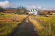 Traditional, rural country croft house in idyllic countryside scenery at Staffin on the Isle of Skye, Scottish Highlands, Scotland.