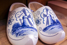 Holland Dutch Wooden Clogs Klompen. White With Delft Blue Painting Of Windmill Scene.