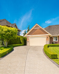 Luxury house with double garage door in Vancouver, Canada.