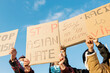 © Xavier Lorenzo - Group of demonstrators protest on the street for equal rights - Asian people demonstrators wearing face masks during stop asian hate campaign - Focus on banners
