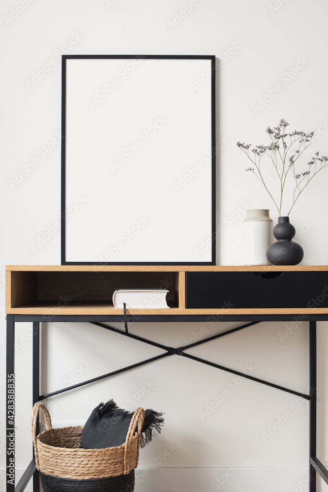 Blank picture frame mockup on white wall. White living room design. View of modern scandinavian style interior with artwork mock up on wall. Home staging and minimalism concept - obrazy, fototapety, plakaty 