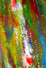 Background From Different Strokes Of Red, Yellow, Green And Blue Paint