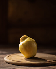 Wall Mural - quince fruit isolate on a dark background