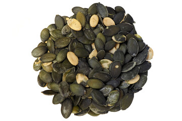 lots of peeled pumpkin seeds lie on a white background top view