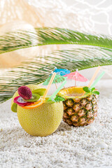 Wall Mural - Tropical drinks in melon and pineapple. Drink for summer heat.